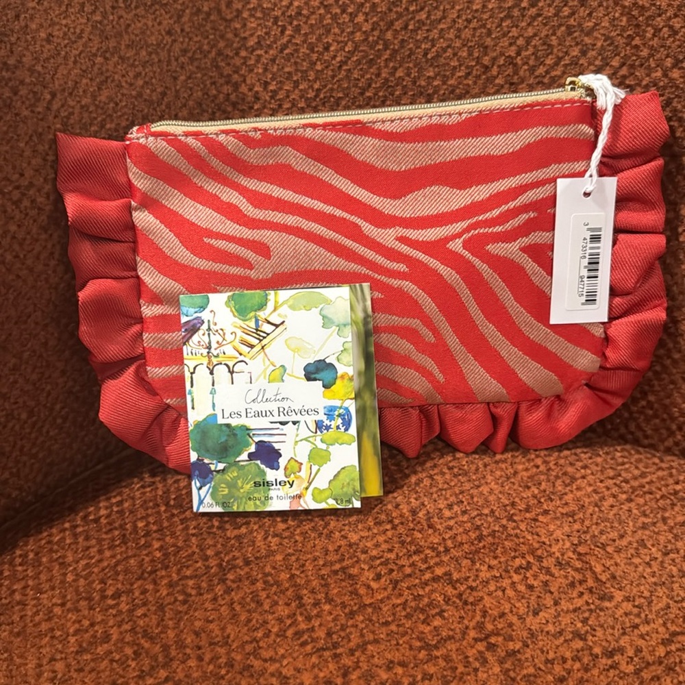 Sisley Small Cosmetic Bag / NWT
W/ Les Eaux Revees Hubert EAU de toilette sample